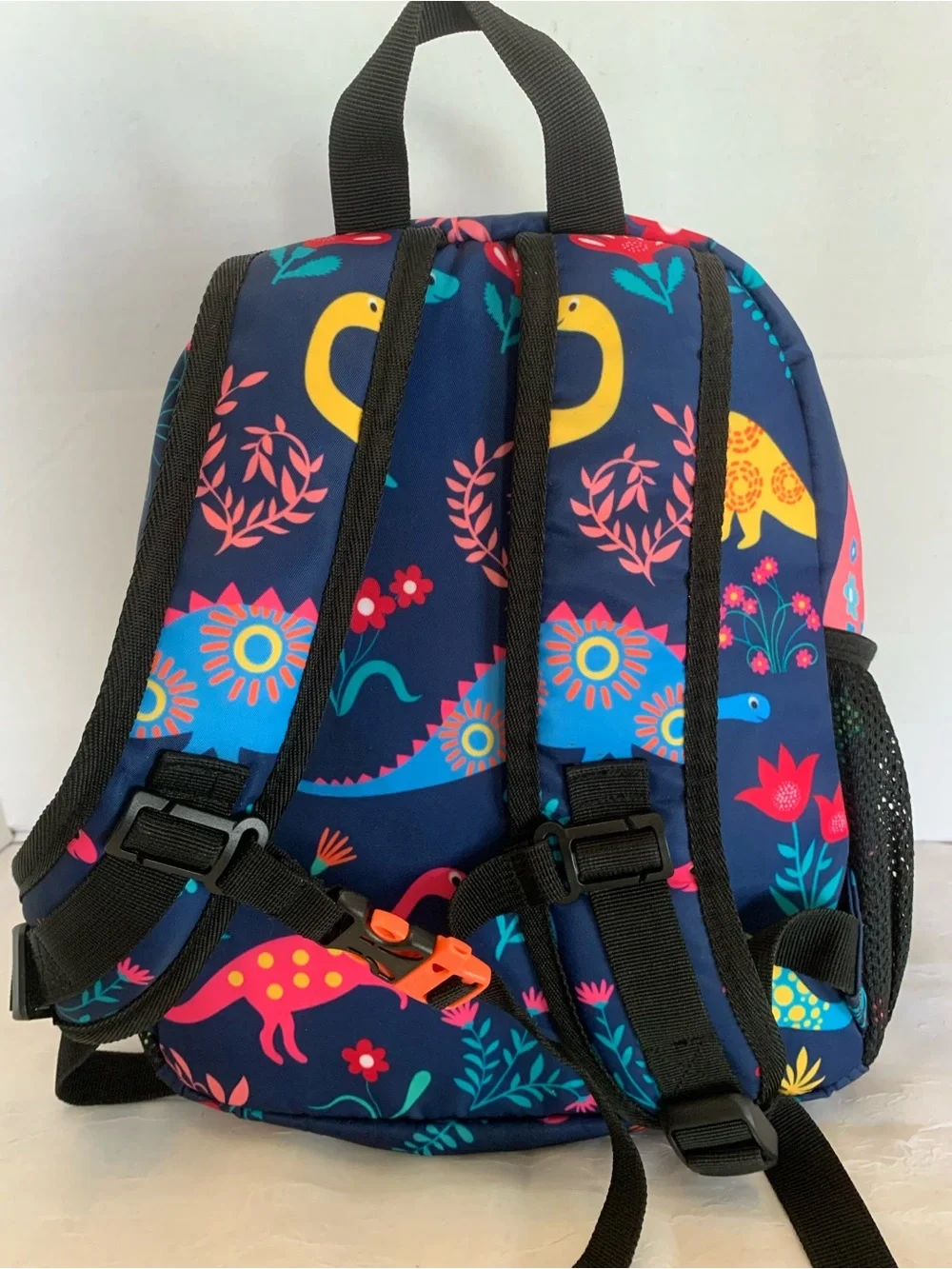 Child’s colorful dinosaur backpack